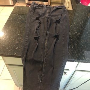Heavily distressed kan can jeans